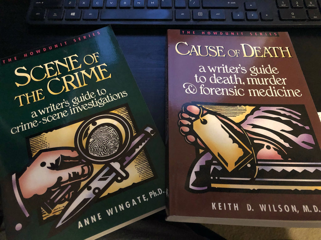 Two books: Scene of the Crime and Cause of Death.