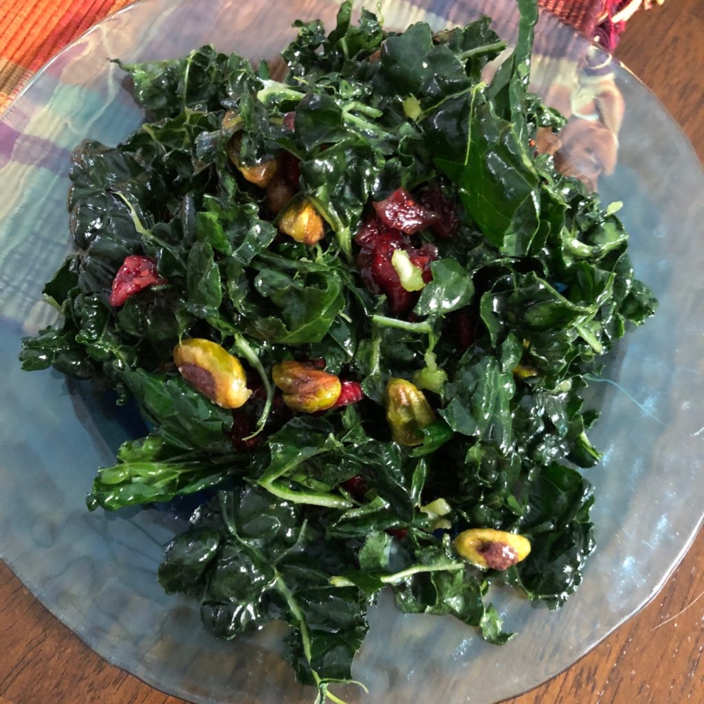 Dinosaur kale with dried cranberries and pistacios.