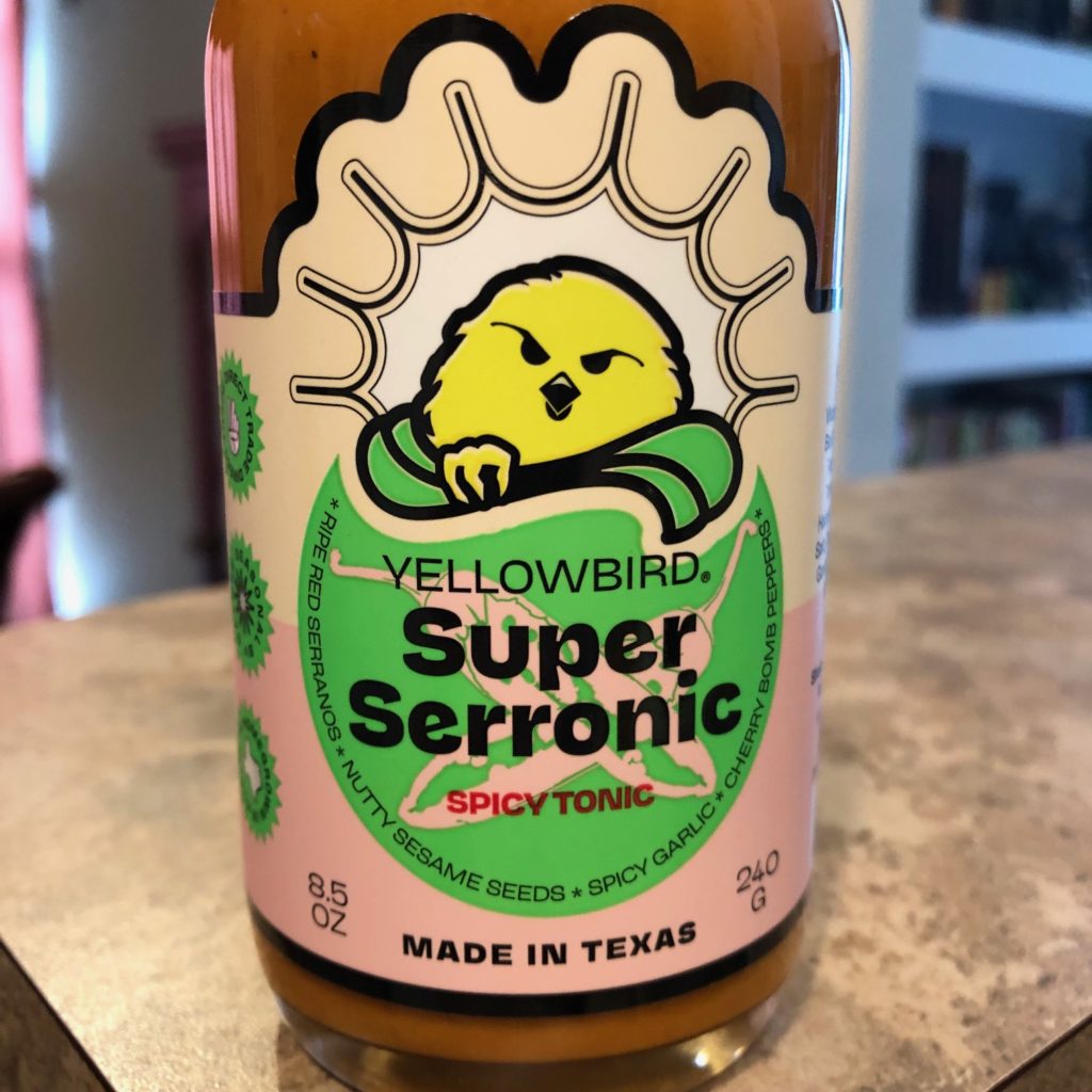 Bottle of Yellowbird Super Serronic Spicy Tonic hot sauce.
